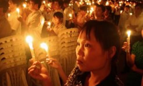 Ho Chi Minh Catholics pray